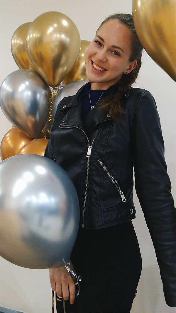 University of Worcester logo on a light blue background