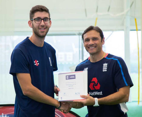 Rob Horn receiving his award for young coach of the year from former England Batting Coach Mark Ramprakash