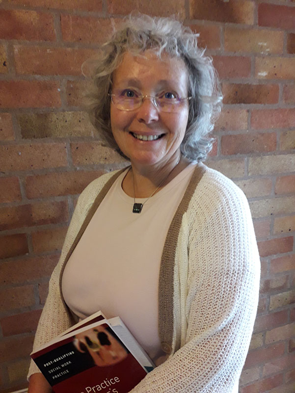 University of Worcester logo on a light blue background