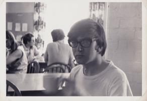man with large glasses in the 1960s