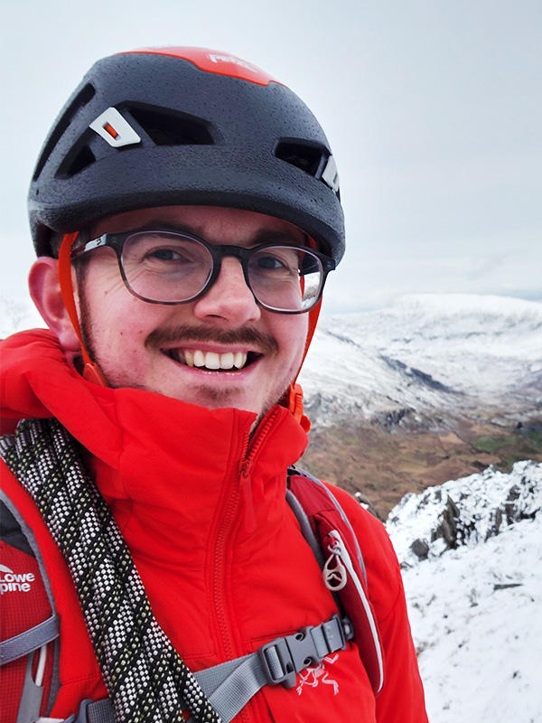 a man hiking in outdoor gear