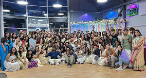 A group of students are at an onam celebration
