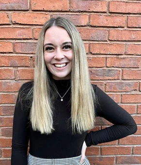 University of Worcester logo on a light blue background