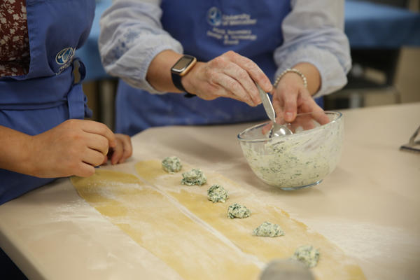 Students making pasta