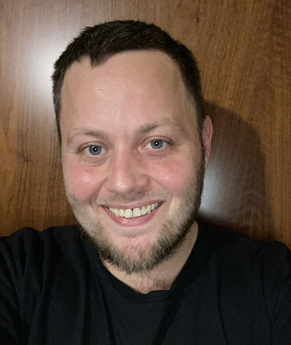 University of Worcester logo on a light blue background