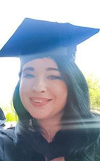 student in graduation robes
