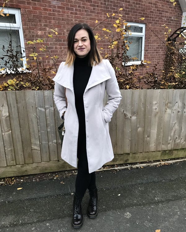 University of Worcester logo on a light blue background