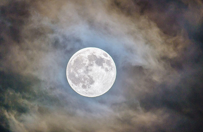 The moon floating above the clouds