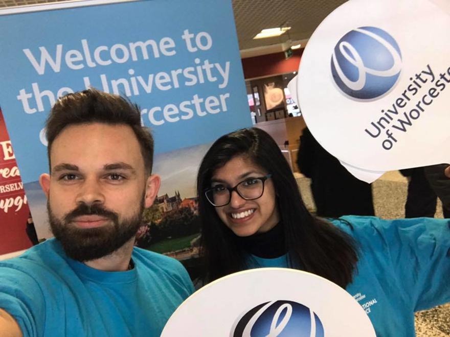 University of Worcester students greet international students at the airport