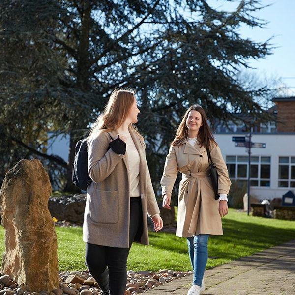 two students walking