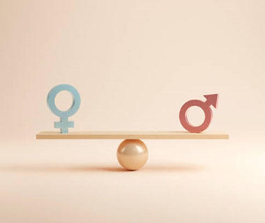 two gender symbols are on a seesaw