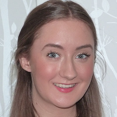 Face shot of a young girl with light brown hair