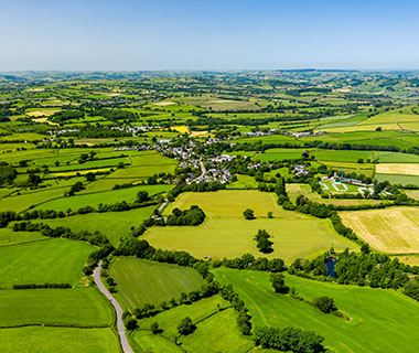 an ariel view of the British countryside with many green fields