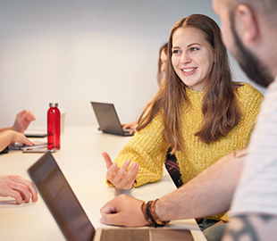 student talking in a group