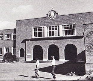 black and white image of the university entrance