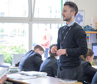 Teacher standing in a classroom