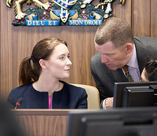 Student and lecturer in a courtroom