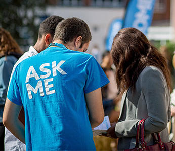 Student assisting open day attendees