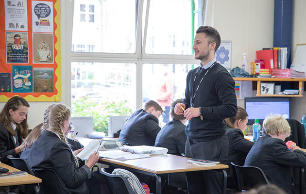 male teacher in a classroom