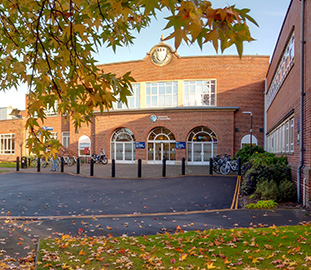 entrance to the university of worcester with autumn colours